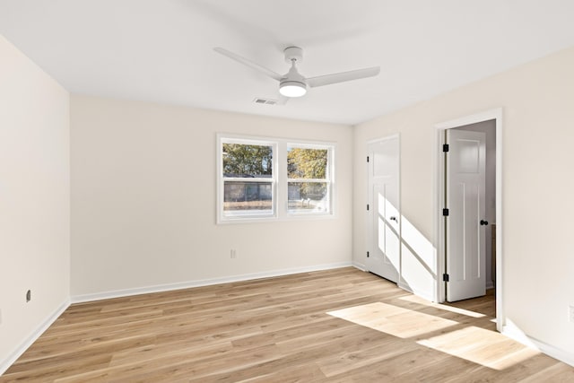 unfurnished room with light hardwood / wood-style floors and ceiling fan