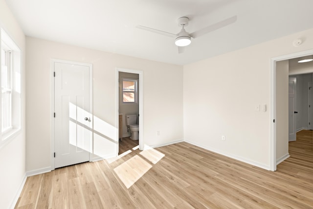 unfurnished room with ceiling fan and light hardwood / wood-style flooring