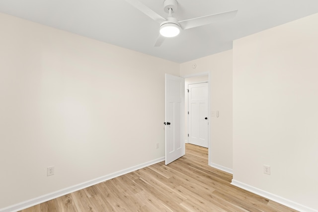 unfurnished room featuring light wood-type flooring and ceiling fan