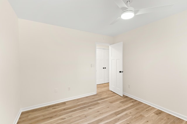 unfurnished room featuring ceiling fan and light hardwood / wood-style floors