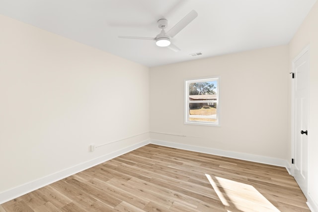 spare room featuring ceiling fan and light wood-type flooring