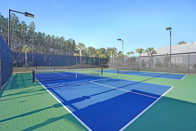 view of tennis court with basketball court