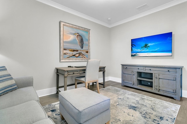 living room featuring ornamental molding and wood-type flooring