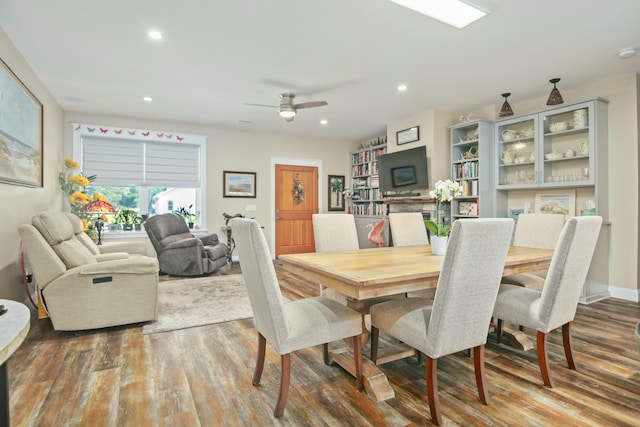 dining room featuring hardwood / wood-style flooring and ceiling fan