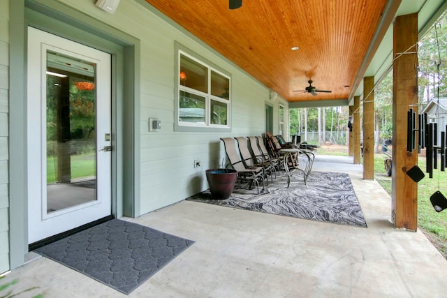 view of patio with a porch and ceiling fan