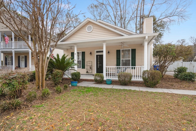 view of front of home featuring a porch and a front lawn