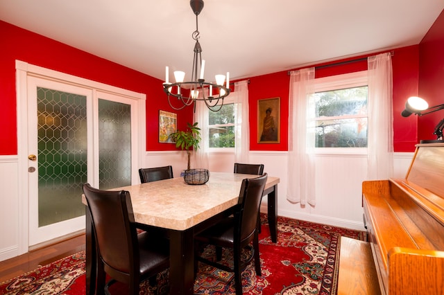 dining area with a notable chandelier