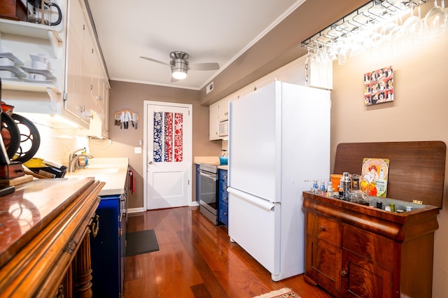 kitchen with white cabinets, white refrigerator, electric range, ceiling fan, and crown molding