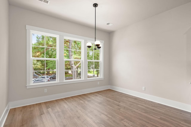 1577 Periwinkle Dr, Mount Pleasant, SC 29466 - unfurnished dining area featuring healthy amount of natural light, wood finished floors, and baseboards