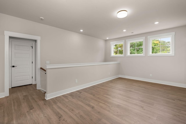 1577 Periwinkle Dr, Mount Pleasant, SC 29466 - spare room featuring wood finished floors, baseboards, recessed lighting, and a smoke detector