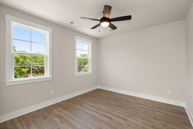 1577 Periwinkle Dr, Mount Pleasant, SC 29466 - unfurnished room with baseboards, wood finished floors, and a ceiling fan