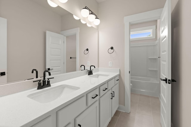 1577 Periwinkle Dr, Mount Pleasant, SC 29466 - full bath with double vanity, toilet, tile patterned flooring, baseboards, and bathtub / shower combination