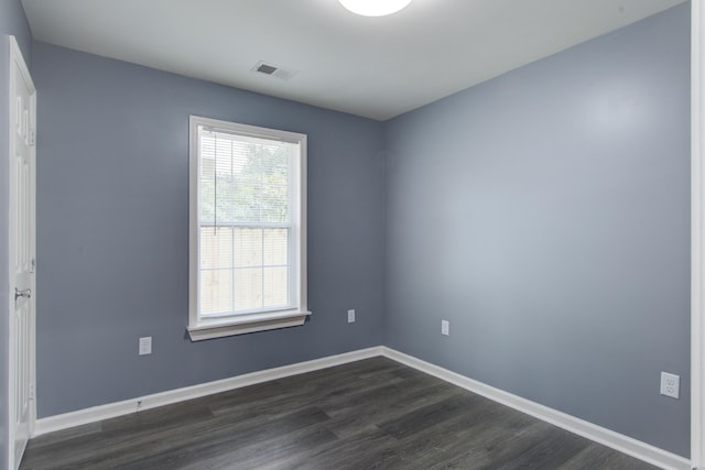 227 Grace St, Walterboro, SC 29488 - empty room featuring dark wood-style floors and baseboards