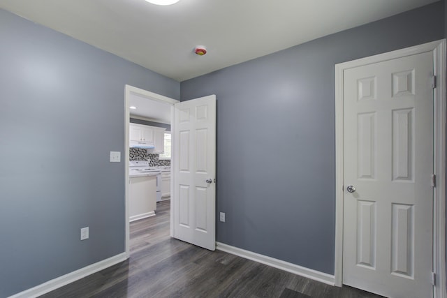 227 Grace St, Walterboro, SC 29488 - empty room with dark wood-style floors and baseboards