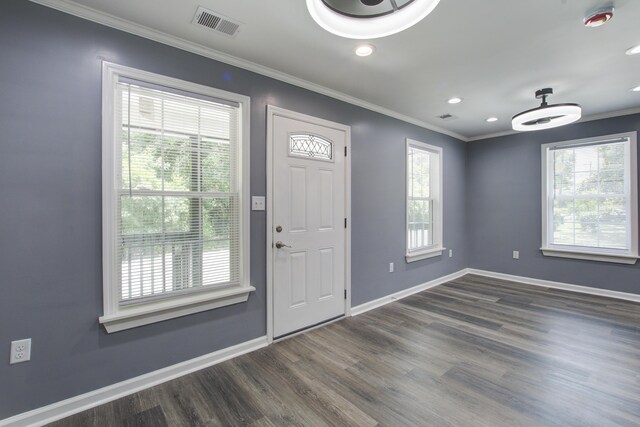227 Grace St, Walterboro, SC 29488 - foyer with healthy amount of natural light, dark wood-type flooring, ornamental molding, and recessed lighting