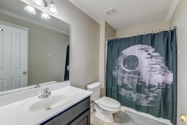 bathroom with vanity, toilet, tile patterned flooring, and a shower with curtain