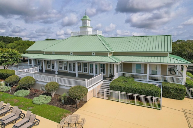 view of building exterior with fence