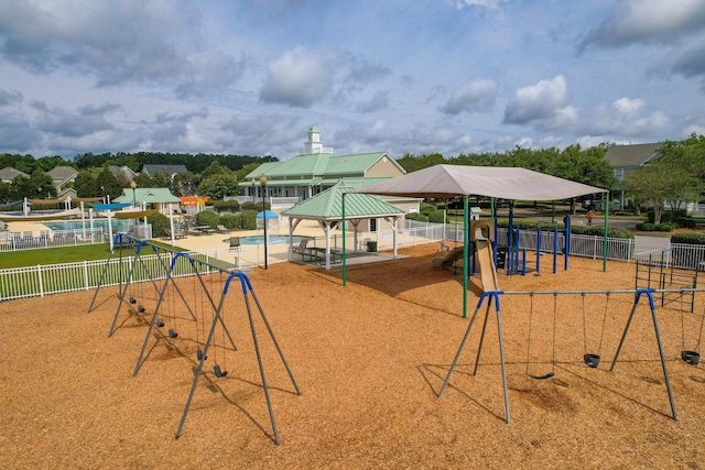 community play area with fence and a gazebo