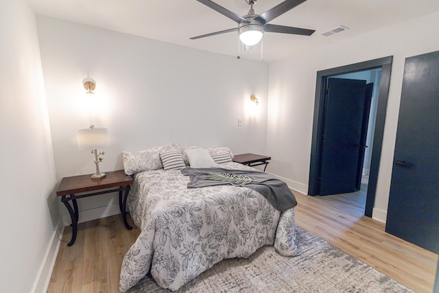 1129 Dickson Ave, Hanahan, SC 29410 - bedroom with light wood finished floors and ceiling fan