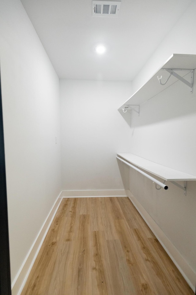 1129 Dickson Ave, Hanahan, SC 29410 - walk in closet with light wood-style floors