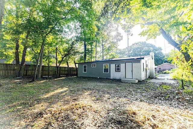 1129 Dickson Ave, Hanahan, SC 29410 - back of property with a fenced backyard and brick siding