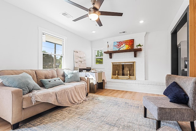 1129 Dickson Ave, Hanahan, SC 29410 - living room with a ceiling fan, a fireplace, wood finished floors, and recessed lighting