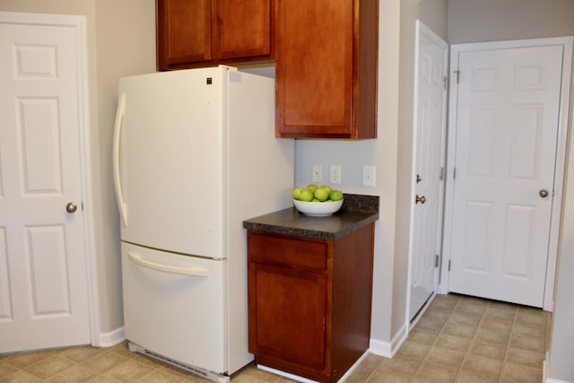 kitchen featuring white fridge