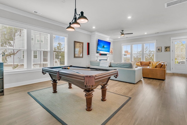 game room with light hardwood / wood-style floors, ceiling fan, ornamental molding, and pool table