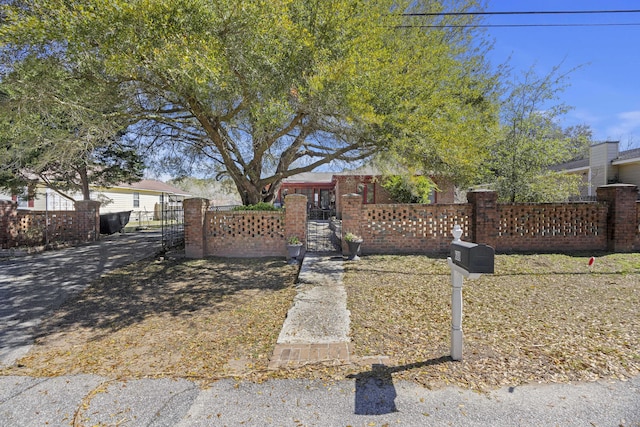 view of front of home featuring a gate and a fenced front yard