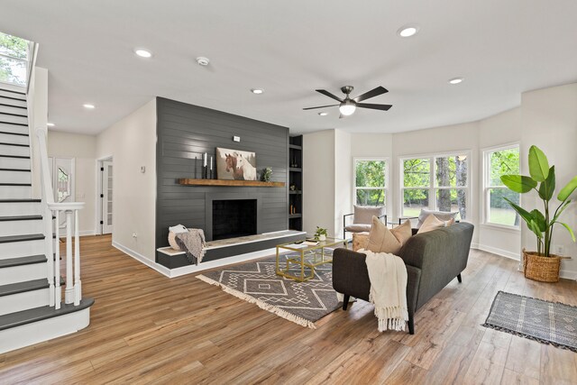 5950 Kelseys Mill Rd, Ravenel, SC 29470 - living area with baseboards, light wood-type flooring, recessed lighting, stairway, and a ceiling fan