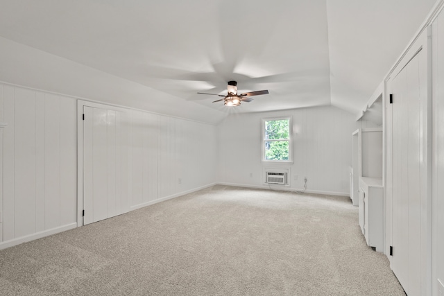 5950 Kelseys Mill Rd, Ravenel, SC 29470 - interior space with vaulted ceiling, light colored carpet, a ceiling fan, and a wall unit AC