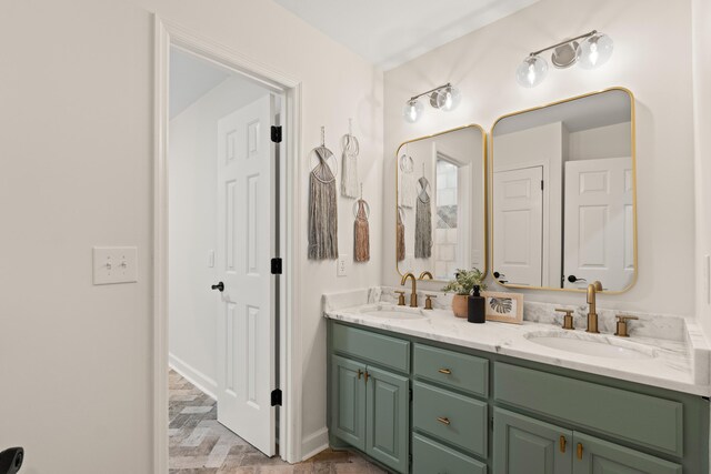 5950 Kelseys Mill Rd, Ravenel, SC 29470 - full bathroom with double vanity, a sink, and baseboards