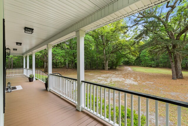 5950 Kelseys Mill Rd, Ravenel, SC 29470 - wooden deck with covered porch