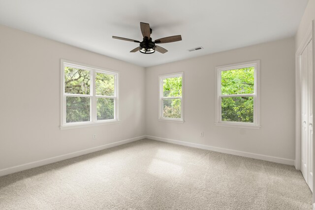 5950 Kelseys Mill Rd, Ravenel, SC 29470 - carpeted empty room with visible vents, baseboards, and ceiling fan
