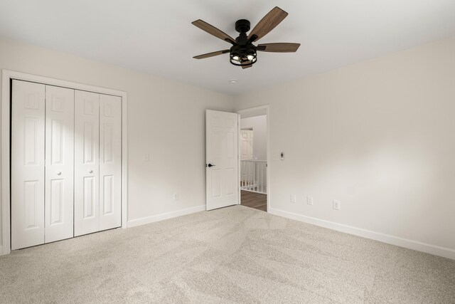 5950 Kelseys Mill Rd, Ravenel, SC 29470 - unfurnished bedroom featuring a closet, baseboards, a ceiling fan, and carpet flooring