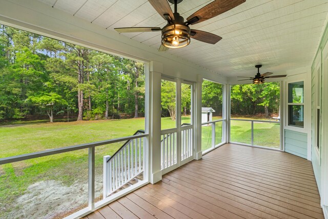 5950 Kelseys Mill Rd, Ravenel, SC 29470 - unfurnished sunroom with a ceiling fan