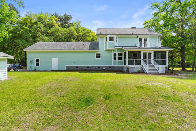 5950 Kelseys Mill Rd, Ravenel, SC 29470 - back of property with a sunroom, crawl space, a lawn, a chimney, and a shingled roof