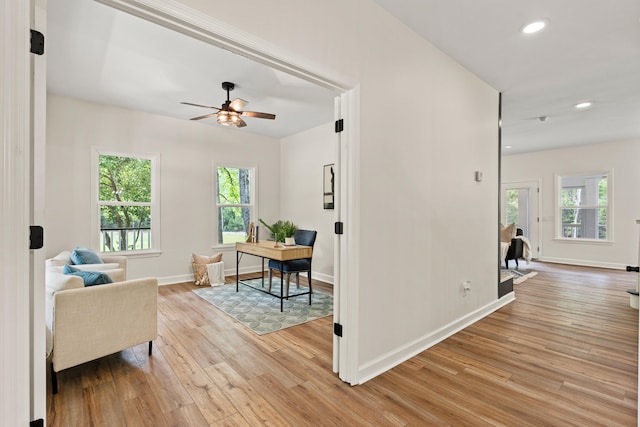 5950 Kelseys Mill Rd, Ravenel, SC 29470 - living room with light wood-style flooring, baseboards, a ceiling fan, and recessed lighting
