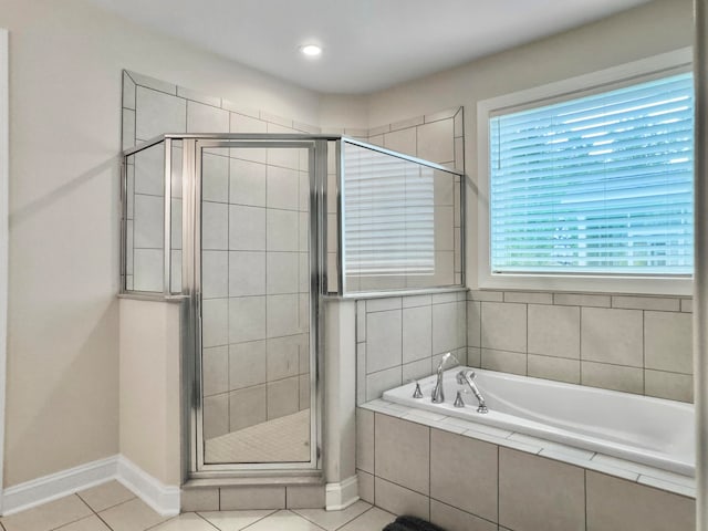 bathroom with plus walk in shower and tile patterned floors