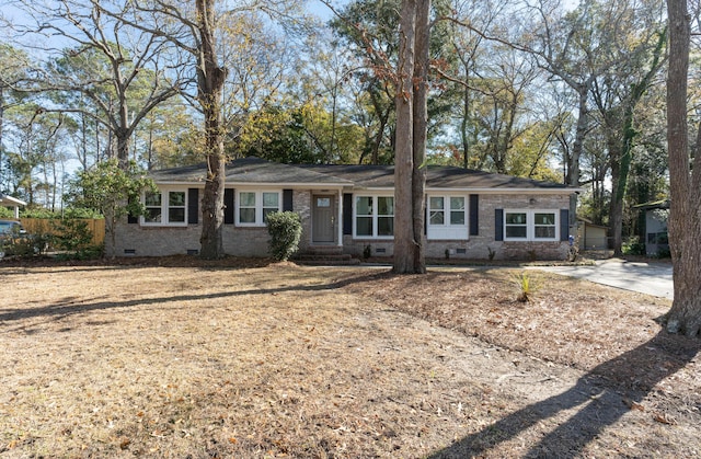 single story home with a garage