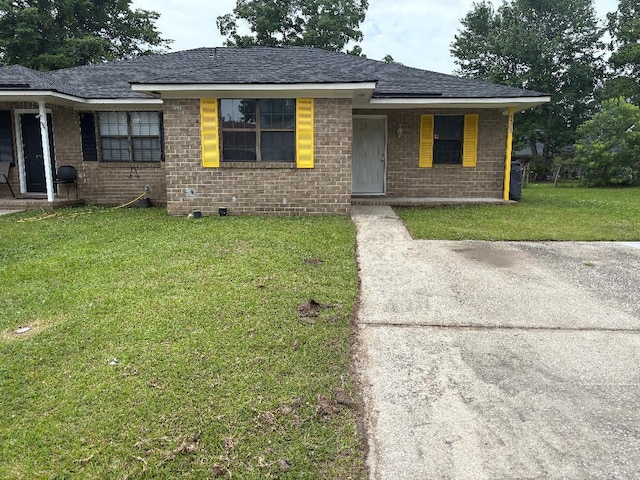 7713 Suzanne Dr, North Charleston, SC 29418 - single story home with a front yard, brick siding, and a shingled roof