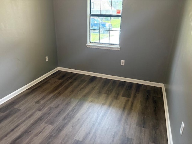 7713 Suzanne Dr, North Charleston, SC 29418 - spare room with baseboards and dark wood-style floors