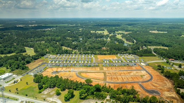 aerial view featuring a forest view