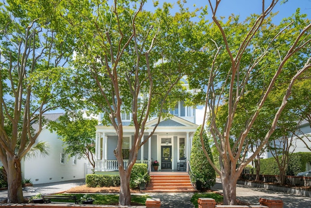 view of front of property featuring covered porch