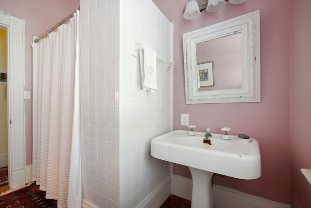 full bathroom with a shower with curtain