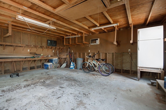garage with a workshop area