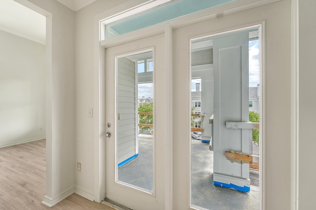 130 River Landing Dr Unit 2310, Daniel Island, SC 29492 - doorway to outside featuring baseboards and wood finished floors