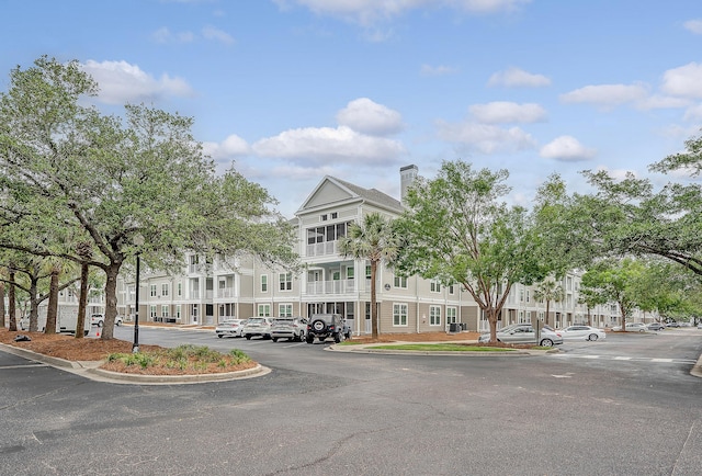 130 River Landing Dr Unit 2310, Daniel Island, SC 29492 - view of building exterior featuring central AC and a residential view
