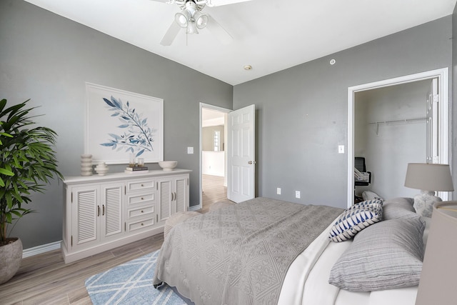 130 River Landing Dr Unit 2310, Daniel Island, SC 29492 - bedroom with light wood-type flooring, baseboards, and a ceiling fan