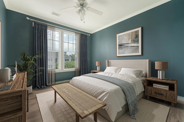 130 River Landing Dr Unit 2310, Daniel Island, SC 29492 - bedroom with wood finished floors, crown molding, a ceiling fan, and baseboards